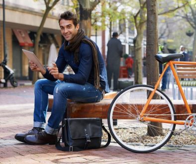 men-model-in-park-with-bike